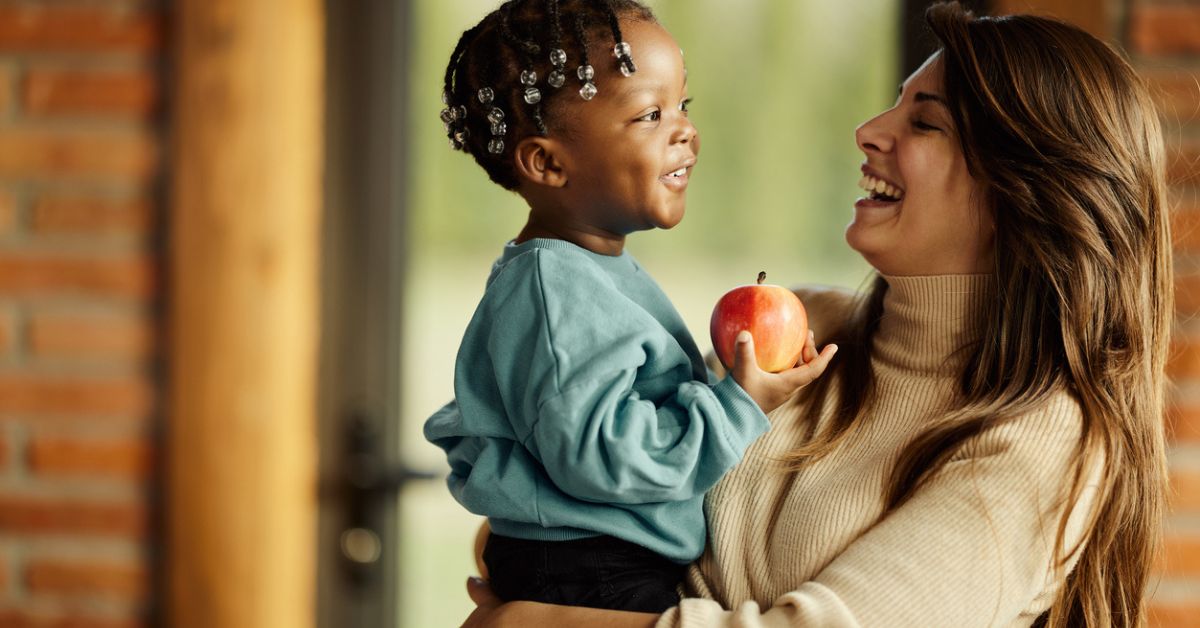 Mom holding her adopted baby